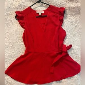 Red peplum top size medium